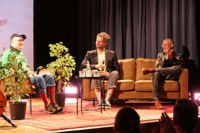 Gesprächsrunde mit Socken: Christoph Dittert, Flo Stielper und Johannes Hartl (von links)