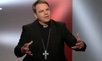 Bischof Stefan Oster SDB / screenshot / YouTube / KIRCHE IN NOT Deutschland