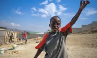 Kind in Haiti / Tim Trad / Unsplash (CC0) 