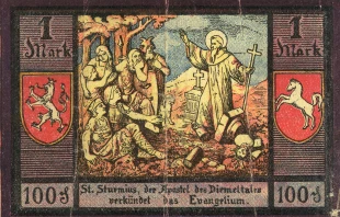 Abbildung des hl. Sturmius auf Notgeld der Stadt Niedermarsberg (1921): „St. Sturmius, der Apostel des Diemeltales, verkündet das Evangelium“. / Gemeinfrei