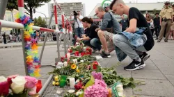 Trauernde in München nach der Bluttat am 22. Juli 2016. / Johannes Simon / Getty Images News