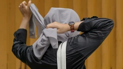 Frau mit Kopftuch / Nada / Unsplash